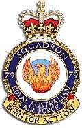 Crest of 79 Squadron, Royal Australian Air Force, featuring a phoenix and the motto "Born for Action"