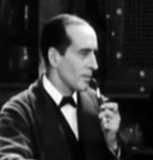 Arthur Wontner as Sherlock Holmes in The Sleeping Cardinal