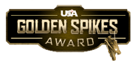 The words "GOLDEN SPIKES AWARD" in gold on a brown polygonal background, with a pair of golden baseball spikes dangling from the last "S" in "Spikes". Above the lettering reads "USA" in white colour.