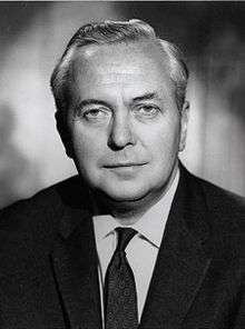 Middle-aged man in profile, clean shaven, full head of greying hair