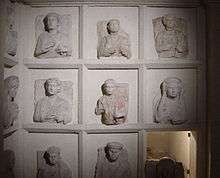 Square burial chambers, with reliefs of the people buried
