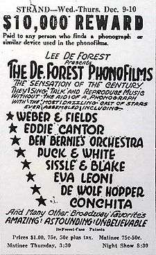 All-text advertisement from the Strand Theater, giving dates, times, and performers' names. At the top, a tagline reads, "$10,000 reward paid to any person who finds a phonograph or similar device used in the phonofilms." The accompanying promotional text describes the slate of sound pictures as "the sensation of the century ... Amazing! Astounding! Unbelievable".