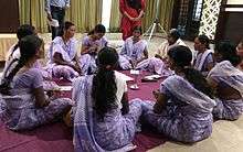 A model self-help group demonstrating at a seminar in Maharashtra.