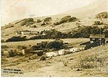 1916 photo postcard of Stinson Beach, showing Airey's Hotel to the left
