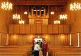 Inside a church, facing away from the altar, towards the entrance.